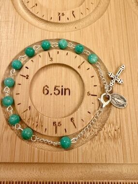 Rosary bracelets with Miraculous Medal charm obtained from the Chapel in Paris